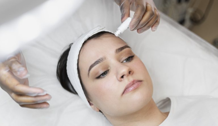 Person getting a Salmon dna fiacial treatment